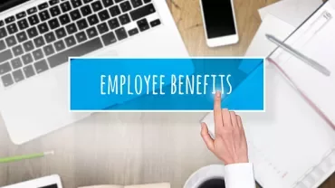 Finger pointing at 'Employee Benefits' text on a digital workspace background.